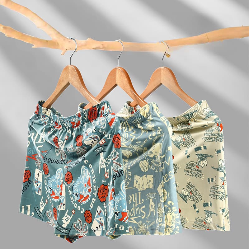 Homens algodão Casual impresso tamanho grande seta calças Shorts respirável jovens estudantes solto calças de pijama con