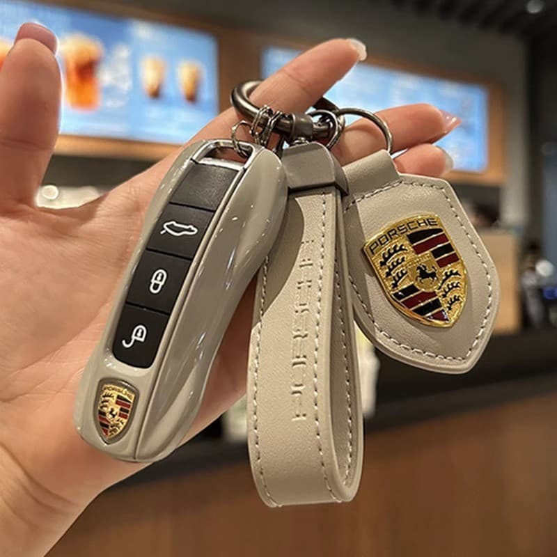 Porsche Cayenne fosco cinza chave escudo adequado para Macan Paramela 718 Taycan 911 escudo fivela novo presente do carr