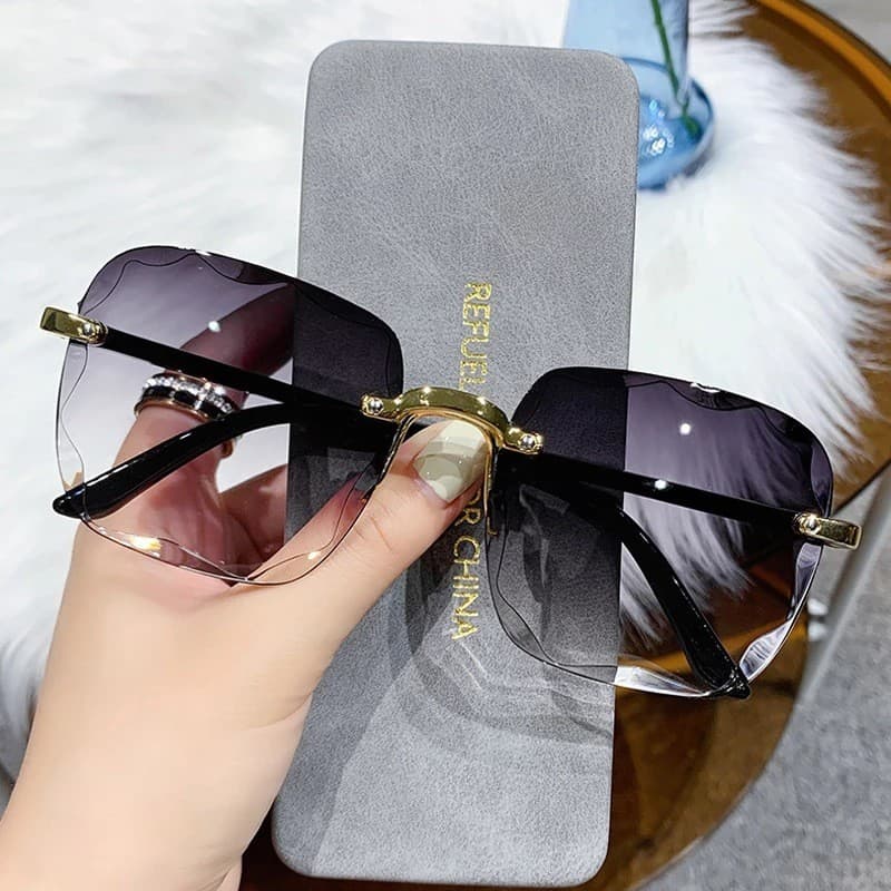 Novo estilo de óculos de sol cor gradiente sem moldura proteção UV400 moda retrô adequada para óculos de sol femininos