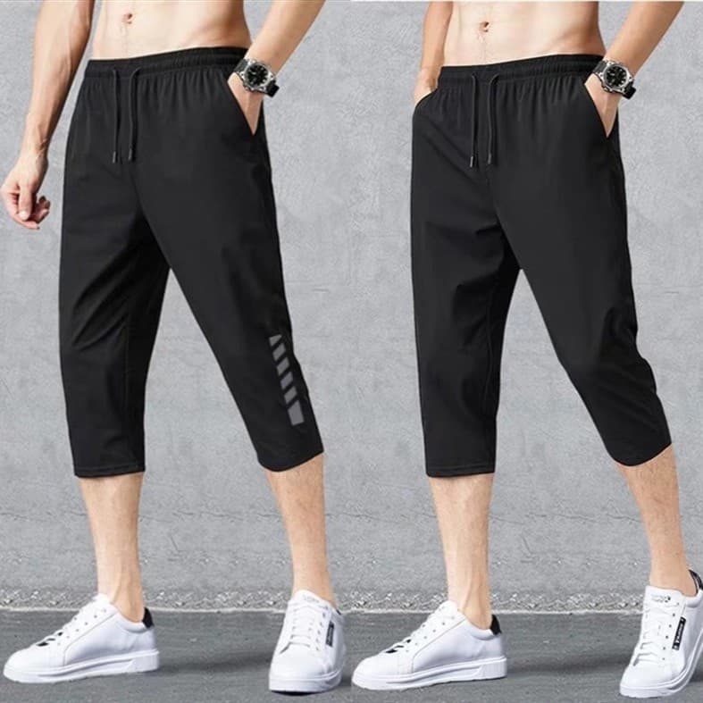 Calças cortadas masculinas verão novo estilo fino estiramento esportes Shorts praia solta calças médias masculinas de se
