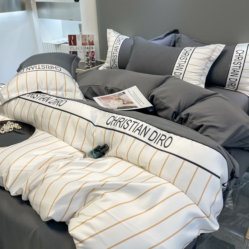 Cama de luxo leve com sensação de alta qualidade Conjunto de quatro peças Atmosfera de alta qualidade Capa de edredão la
