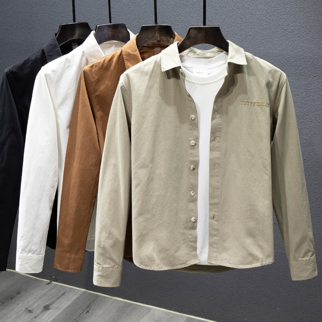 Primavera outono cor sólida camisa masculina de manga comprida 2025 novo estilo solto All-Match juventude simples camisa