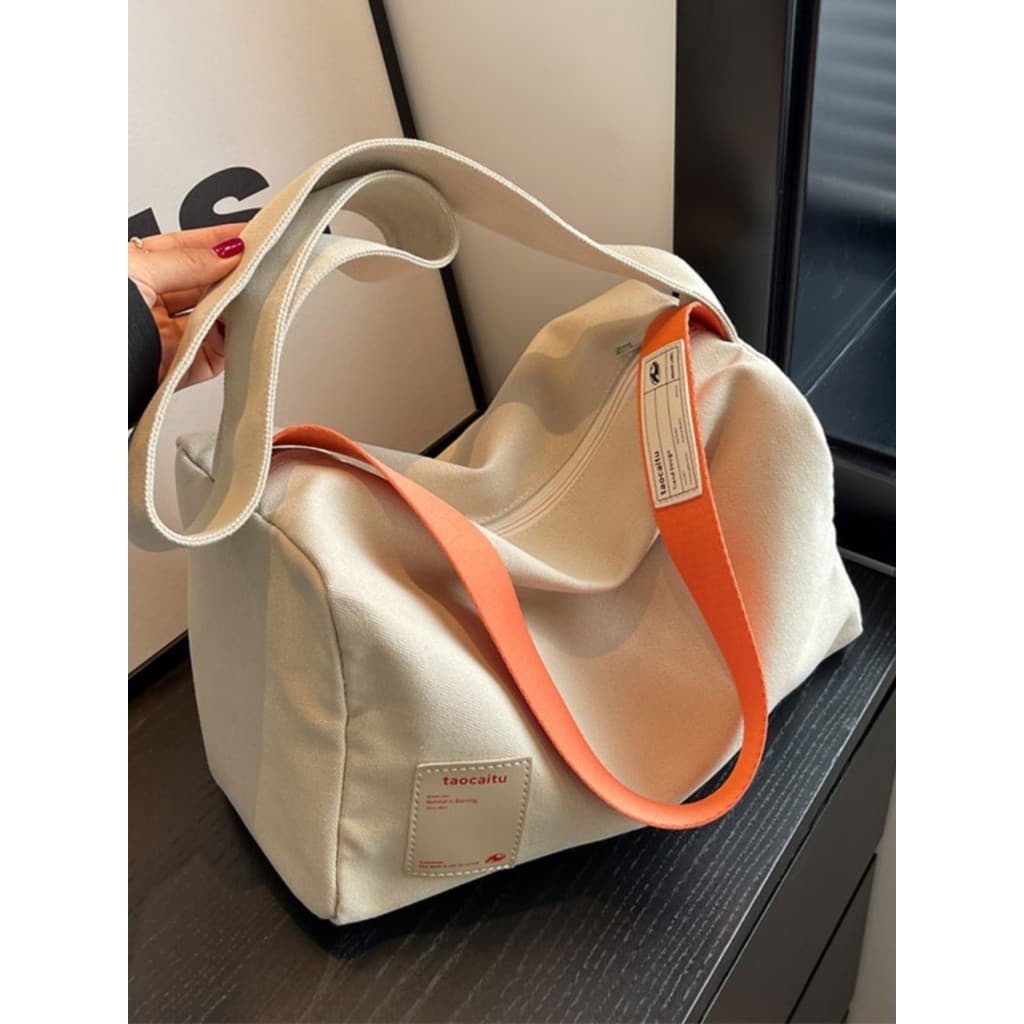 Bolsa de lona mensageiro feminina 2026 novo estilo moda grande capacidade torrada travesseiro saco High-End sentido um o