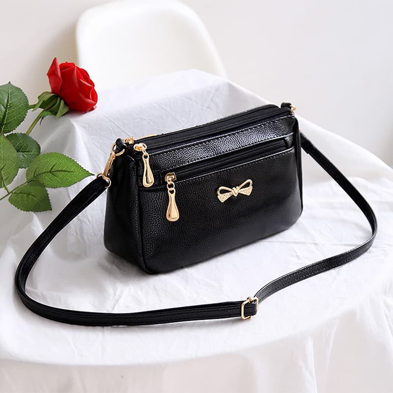 Bolsa pequena pequena bolsa mensageiro bolsa feminina japonesa High-End sensação cor sólida zíper All-Match moda mãe com