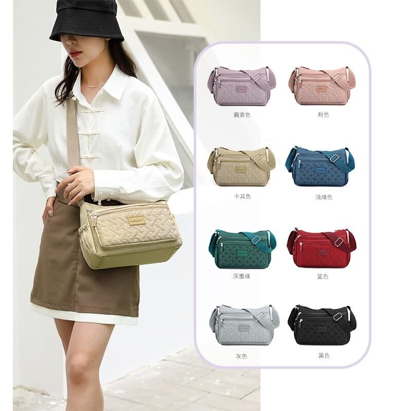 Bolsa mensageiro de pano de náilon feminina 2023 novo estilo Oxford pano Multi-camada bolsa mãe de meia-idade grande @-