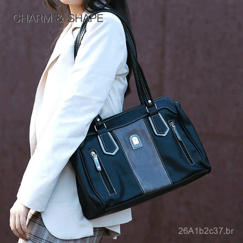 Fabricante vende bolsas femininas casuais europeias e americanas da moda, bolsas de ombro pretas estilosas, bolsas trans