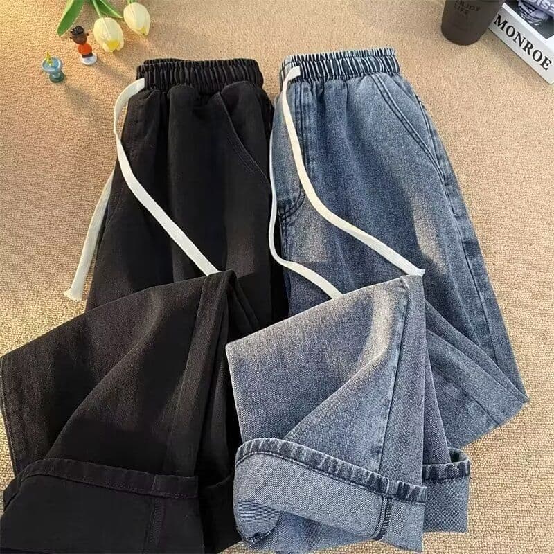 Calças de brim de cintura elástica das mulheres dos homens primavera novo estilo solto All-Match na moda americano High