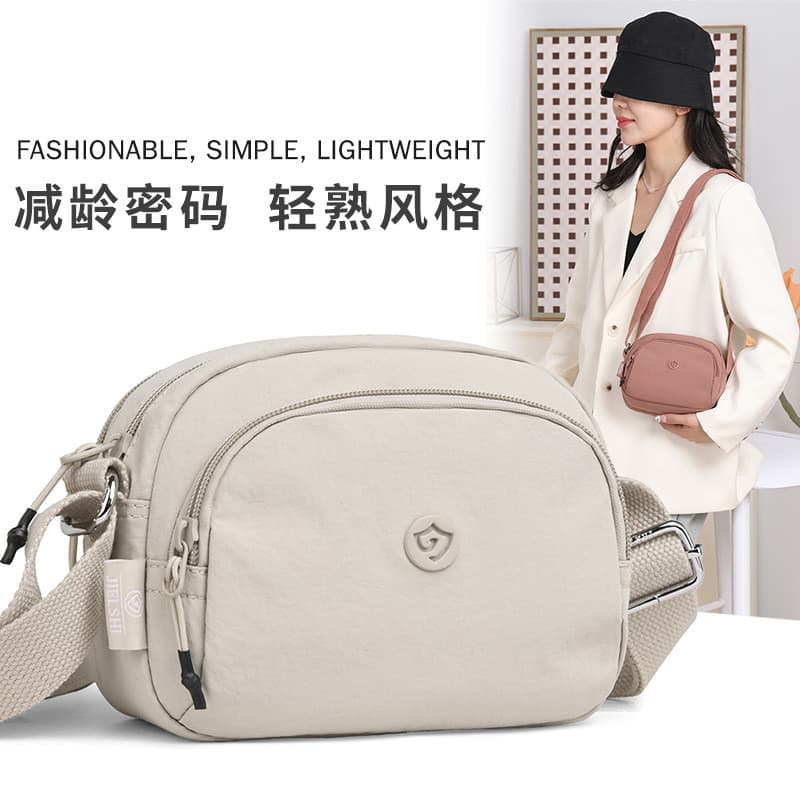 Bolsa para celular feminina bolsa mensageiro leve multicamadas pano de Nylon à prova d'água pequena bolsa redonda Casual