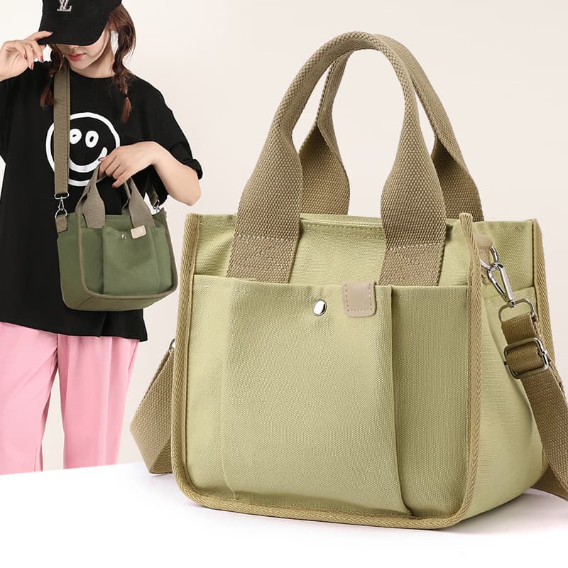 2026 novo estilo estilo japonês portátil bolsa de lona feminina Diagonal trabalho com lancheira saco mamãe saindo pequen