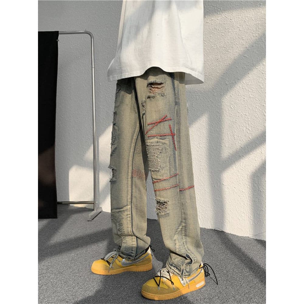 Americano High street lavado angustiado rasgado gradiente Jeans masculino ins street Wear em linha reta Retro solto calç