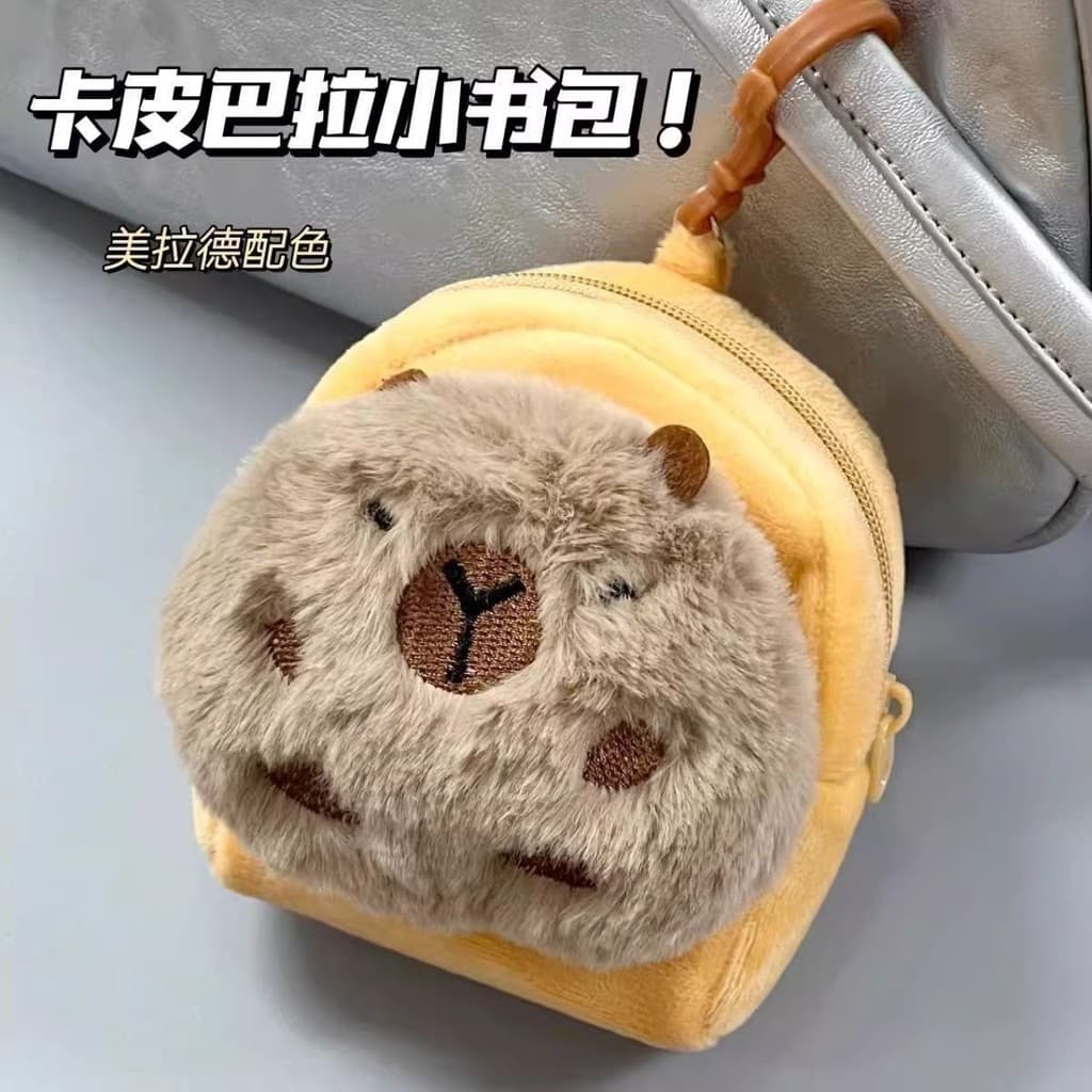 Novo bonito Kapibara bolsa de moedas de pelúcia capivara saco pingente fone de ouvido das mulheres dos homens armazename