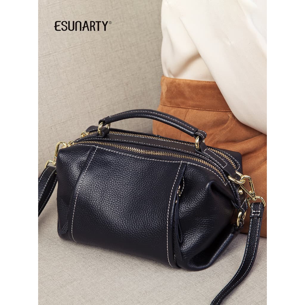Bolsa Boston Popular deste ano feminina 2026 novo estilo moda couro genuíno portátil travesseiro bolsa de ombro feminina