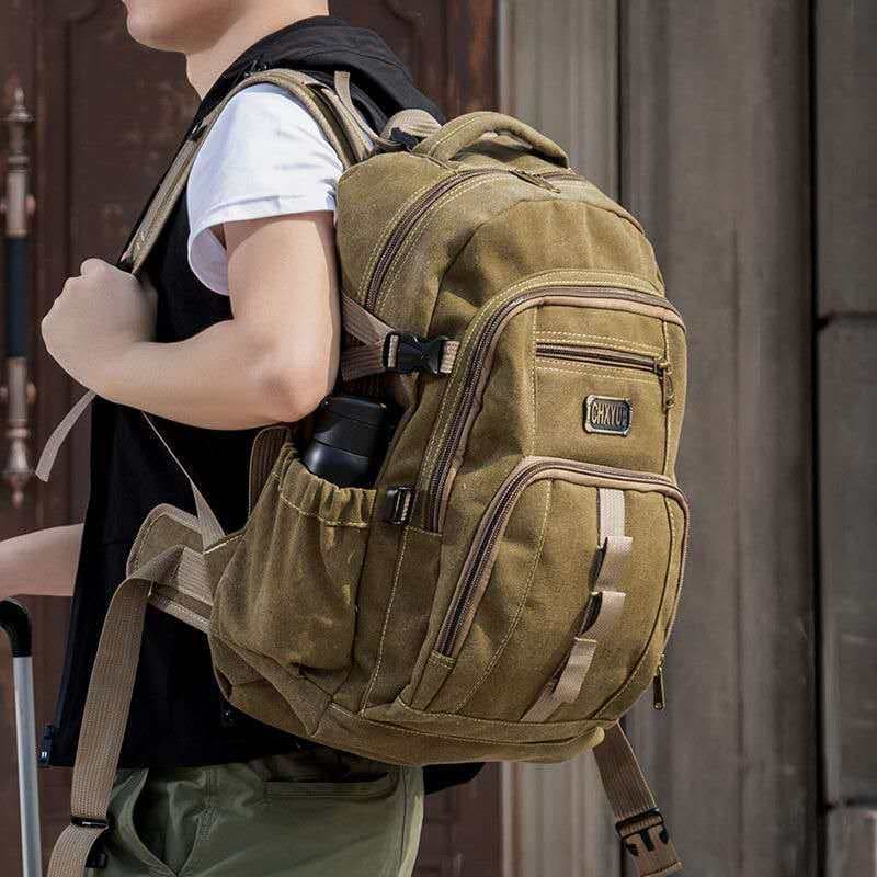 Resistente ao desgaste durável 60L engrossado lona mochila masculina Retro moda na moda mochila das mulheres dos homens
