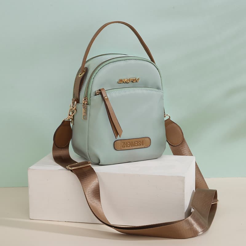 Bolsa feminina portátil 2023 novo estilo na moda saco do mensageiro feminino náilon Oxford pano portátil pequeno quadrad