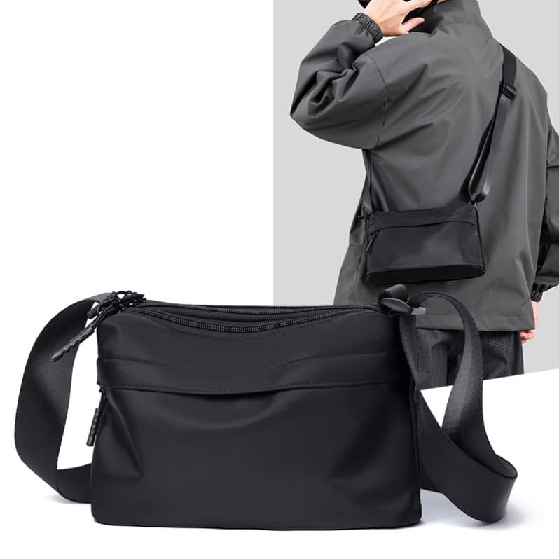 Novo estilo bolsa mensageiro masculina bolsa de ombro simples All-Match passeio masculino portátil pequeno saco portátil