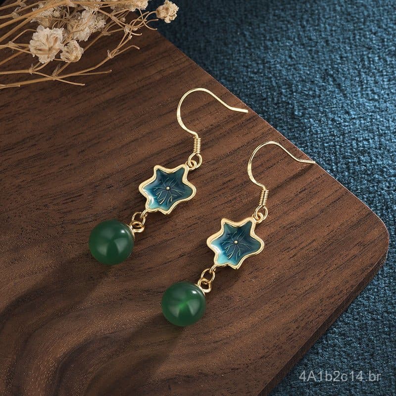 Brincos de moda com design exclusivo, feitos de cobre banhado a ouro 24K, com acabamento artesanal em esmalte com efeito
