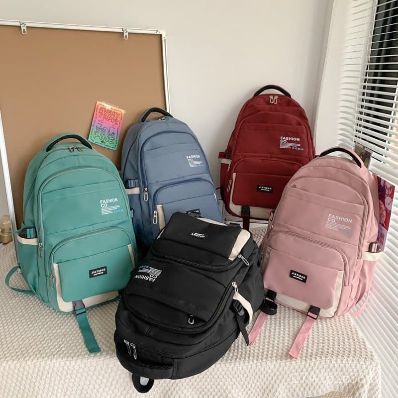 Nova mochila de moda estilo coreano para estudantes do ensino fundamental e médio, mochila casual simples de grande capa