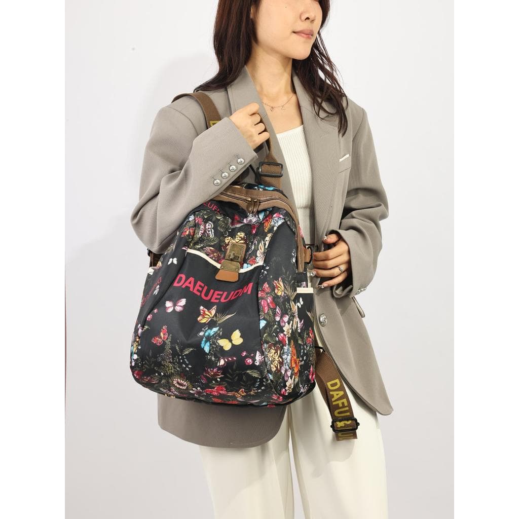 Leve moda mochila de viagem feminina 2025 novo estilo moda à prova dwaterproof água senhoras mochila Oxford pano viagem