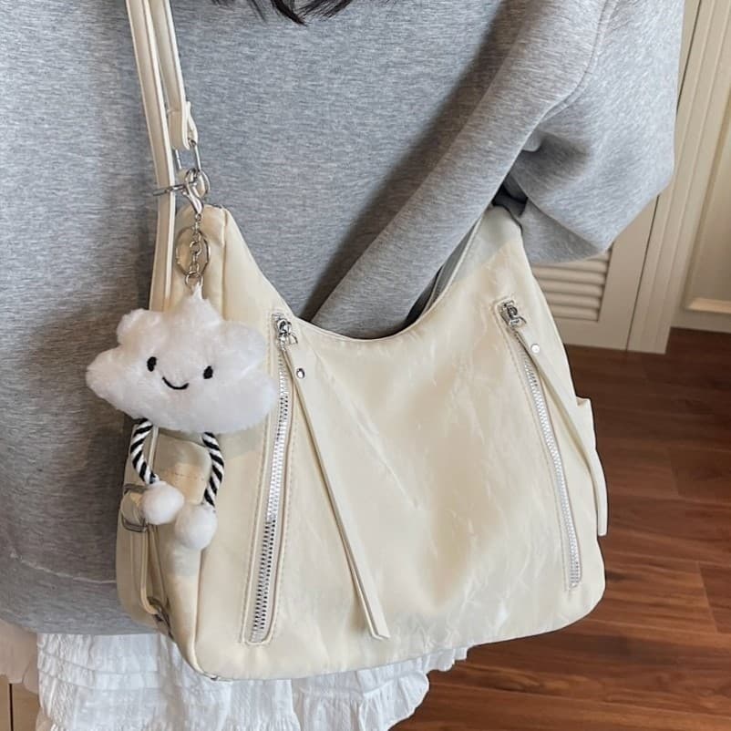 Bolsa feminina mochila High-End sentimento 2025 novo estilo multifuncional de três propósitos axilas nicho Design Cross-