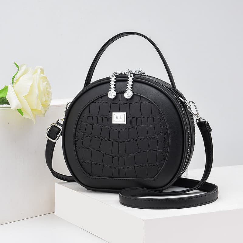 Bolsa feminina 2026 novo estilo moda pequena bolsa redonda feminina Crossbody All-Match Popular bolsa redonda na moda