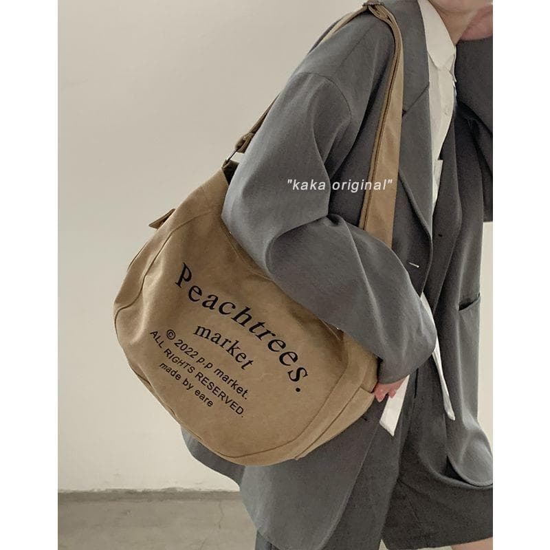 Bolsa de lona feminina grande capacidade 2025 novo estilo verão All-Match simples bolsa de ombro saco de pano classe Com