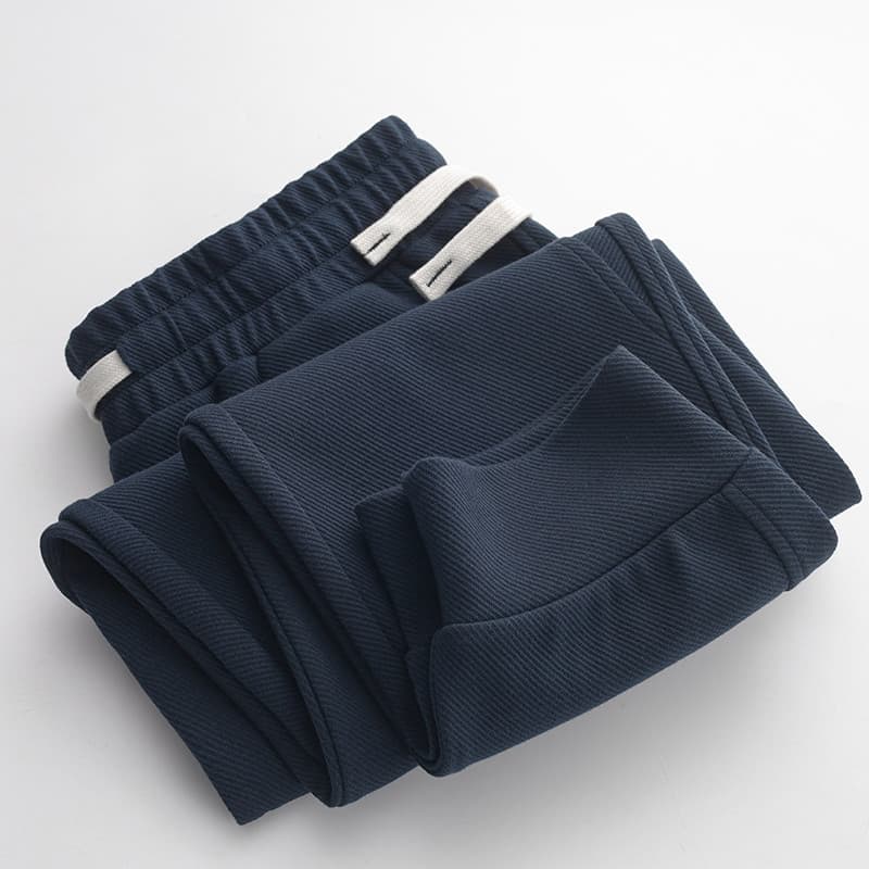 Um par de calças de moletom Super combinadas!Calça de moletom solta de sarja azul marinho pesada masculina esportiva Cas