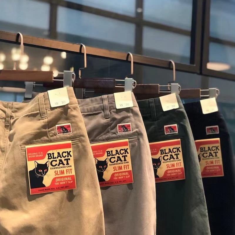 Americano Retro gato preto simples cor sólida algodão ajuste pequeno em linha reta All-Match calças casuais grosso outon
