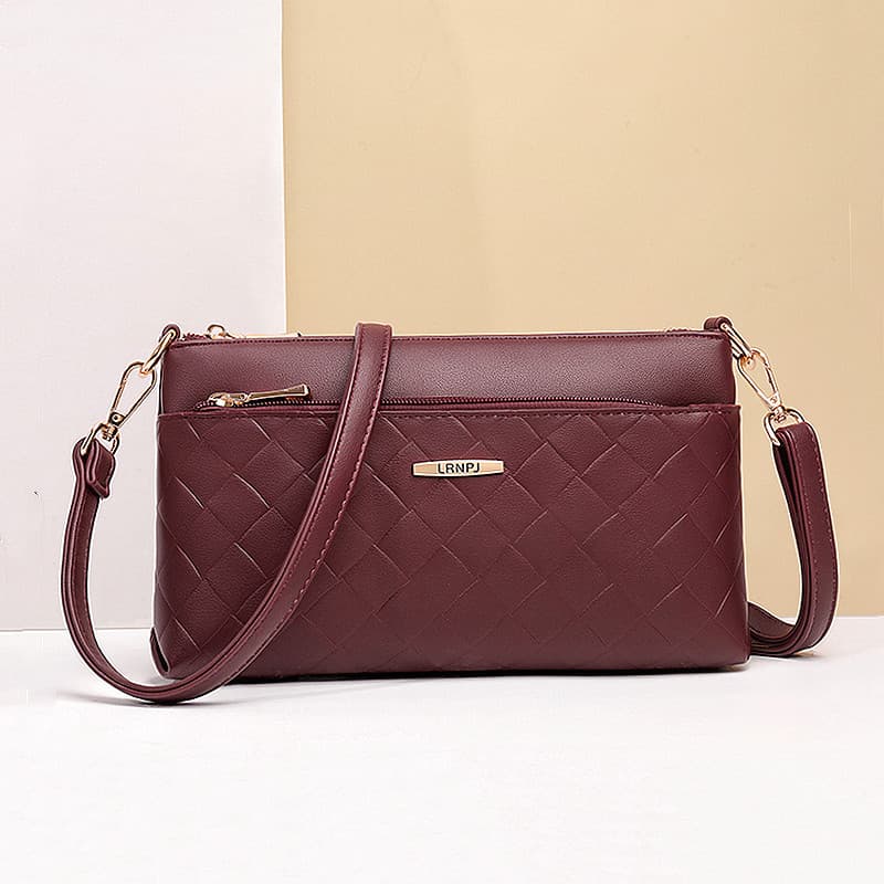 Bolsa mãe de meia-idade feminina 2025 novo estilo verão Casual moda couro macio couro genuíno portátil de um ombro mensa