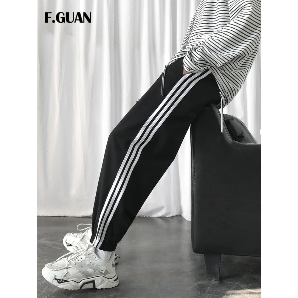 Primavera outono calças esportivas masculinas até o tornozelo calças cenoura três barras Leggings calças soltas perna la
