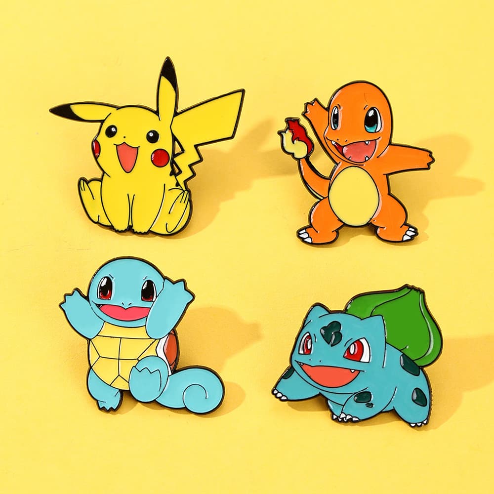 [4pcs] Broches de Liga Pokémon - Decora Roupas e Mochilas