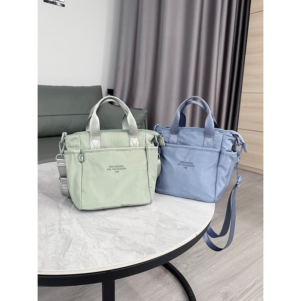 Pequena bolsa pequena feminina novo estilo nicho Design High-End saco de pano moda All-Match Cross-corpo Mini Tote peque