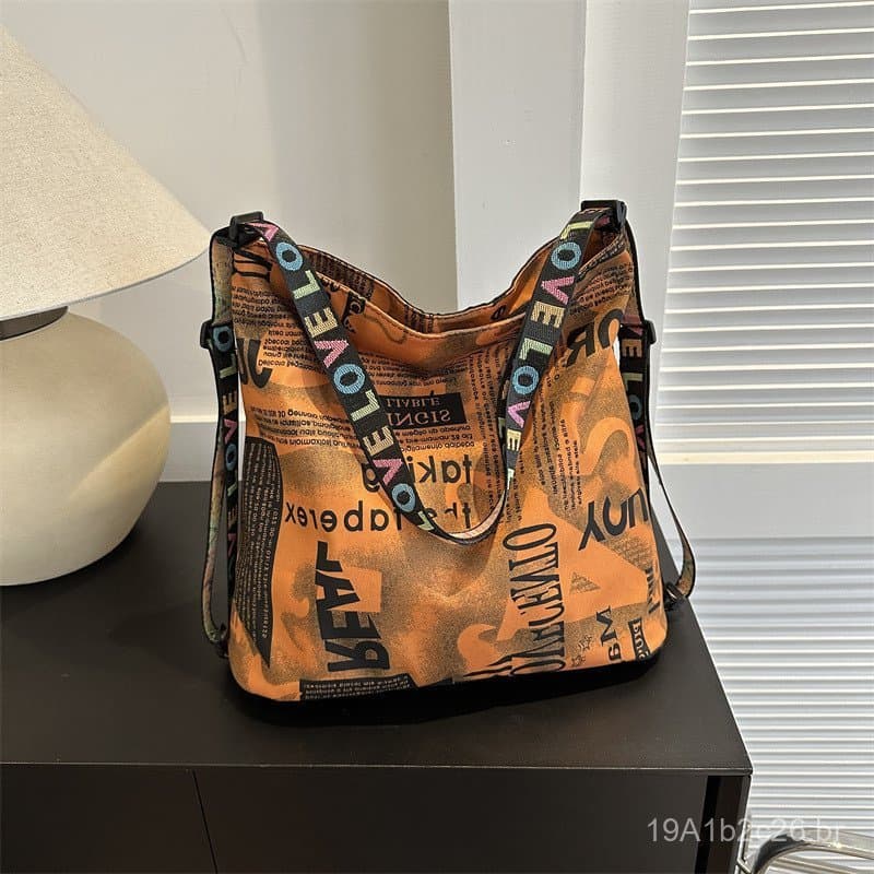Mochila estampada moderna de duas alças e de uma alça, nova versão coreana 2023, bolsa de ombro simples, casual e versát