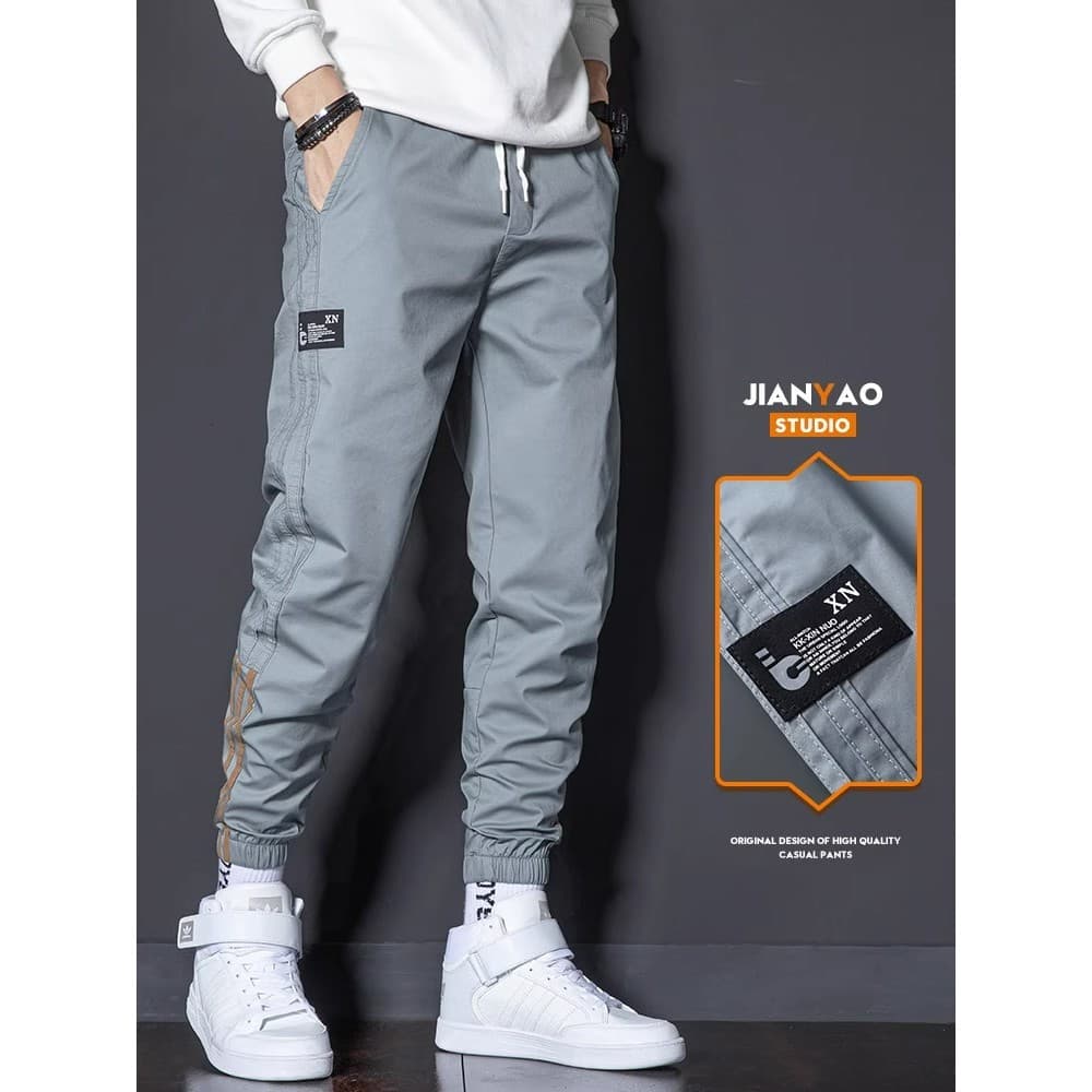 Calças casuais masculinas soltas Leggings macacão 2026 novo estilo verão estilo fino High-End Street Wear All-Match calç