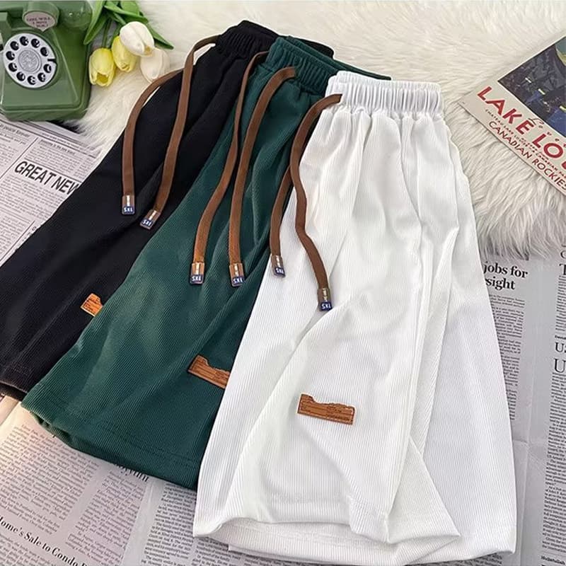Calções de secagem rápida de seda gelo masculino solto Street wear respirável calças de cinco pontos ins estilo Hong Kon