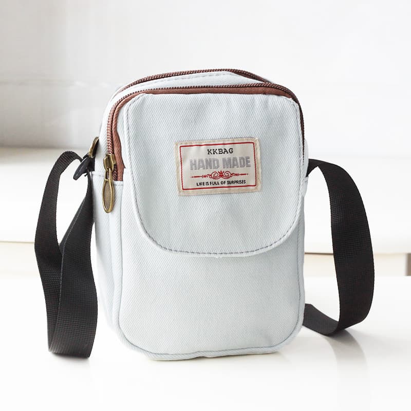 Bolsa para celular feminina mensageiro novo estilo lona All-Match grande capacidade de carregamento tesouro zíper de cam