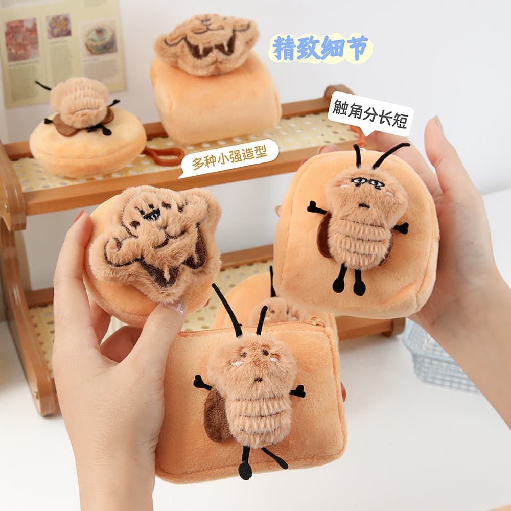 Estilo bonito Xiaoqiang moeda bolsa dos desenhos animados Mini fone de ouvido saco de armazenamento chaveiro saco escola