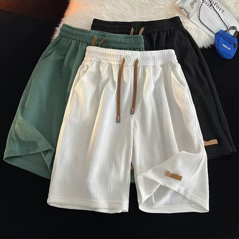 Calções de secagem rápida de seda gelo masculino solto Street wear respirável calças de cinco pontos ins estilo Hong Kon