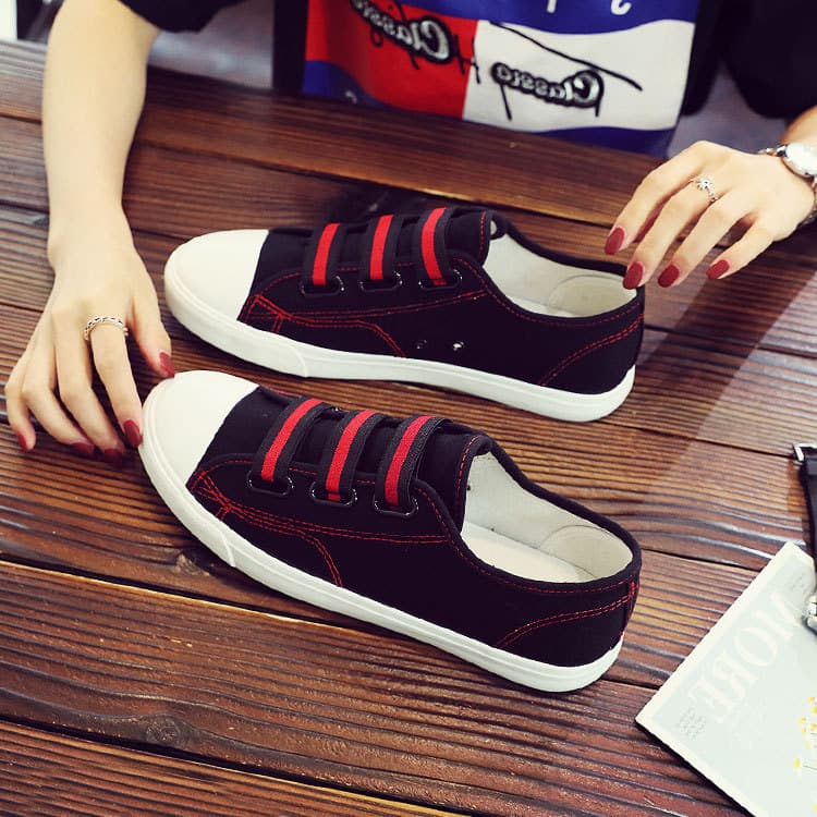 2026 primavera novo estilo masculino rendas respirável sapatos de lona estudante sapatos planos preguiçosos All-Match sa