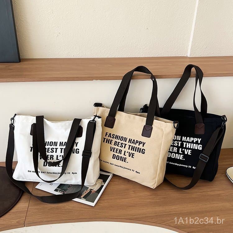 Nova bolsa de lona, bolsa de ombro e transversal, bolsa feminina de grande capacidade com design estampado.