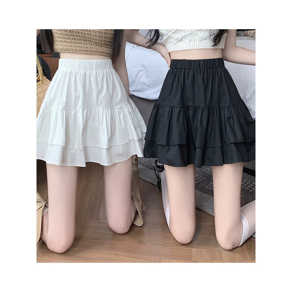 Saia de bolo branco estilo curto 2026 novo estilo saia feminina verão Puff saia pequena guarda-chuva Base a linha saia