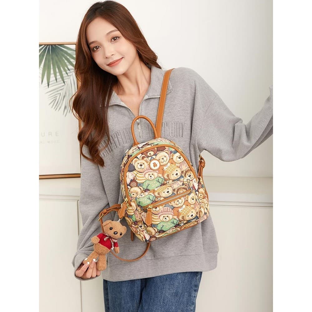 Winnie the pooh acessório mochila menina lona bonito pequena mochila winnie the pooh versão coreana All-Match faculdade