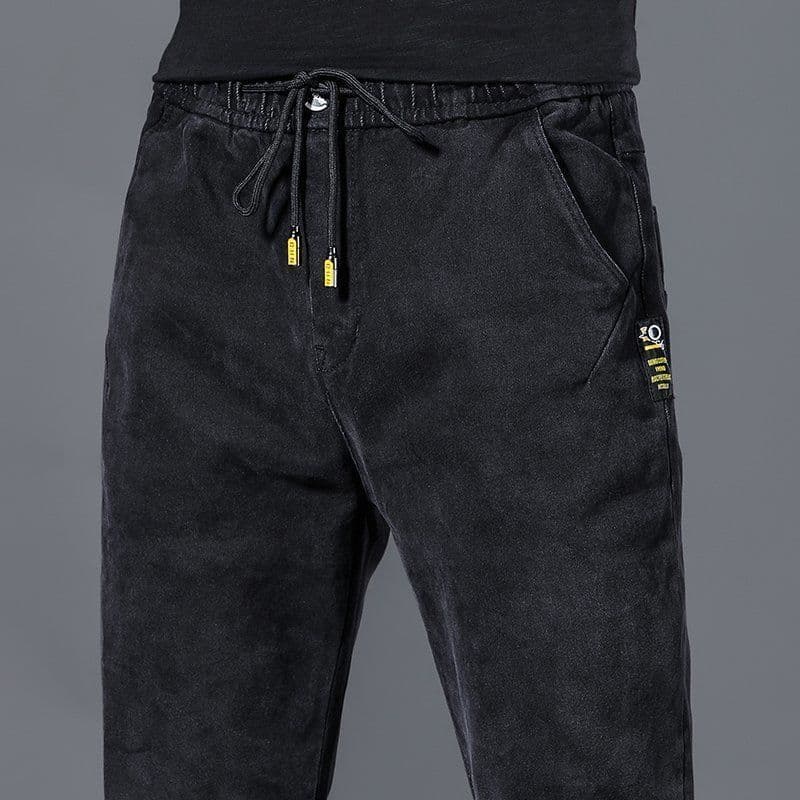 Calças de brim de cintura elástica masculinas soltas tamanho grande Harem calças outono inverno novo estilo calças de lã