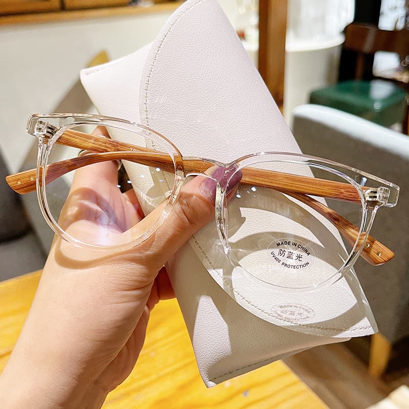 Óculos de proteção anti-luz azul retro TR90, óculos femininos de moda com armação de madeira e lentes planas.