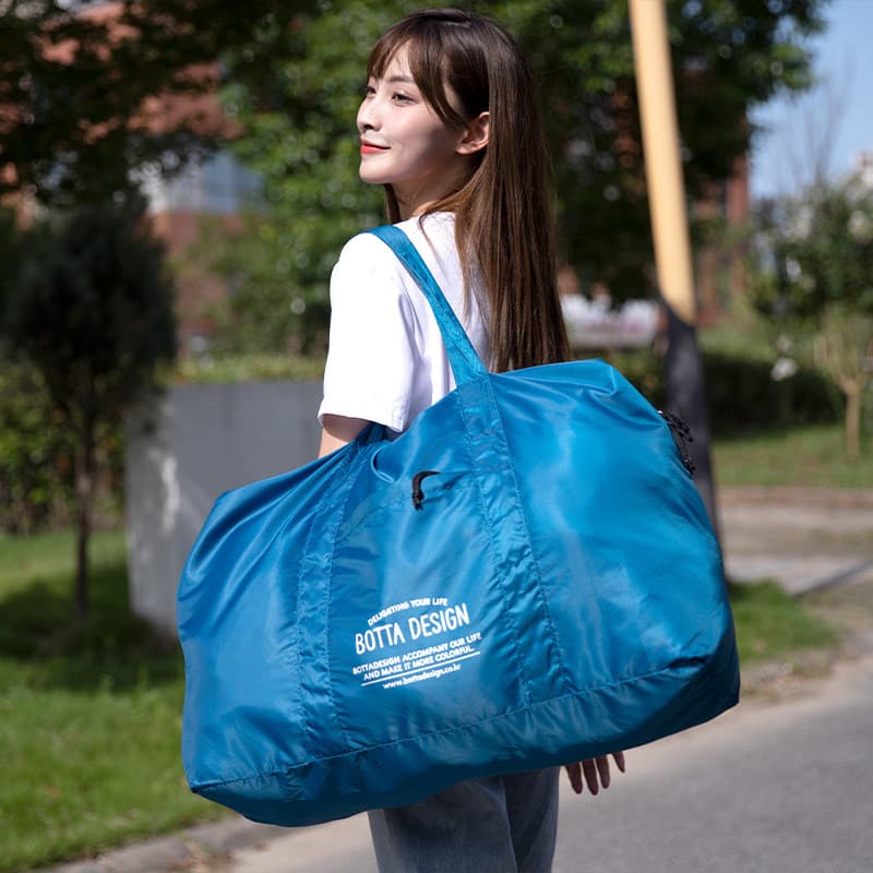 Bolsa de viagem feminina portátil leve à prova d'água versão coreana de curta distância grande capacidade dobrável viage