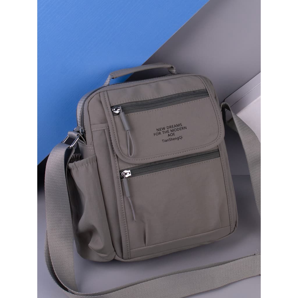 Bolsa de ombro masculina 2026 novo estilo moda esportes mensageiro saco portátil grande capacidade multifuncional Casual
