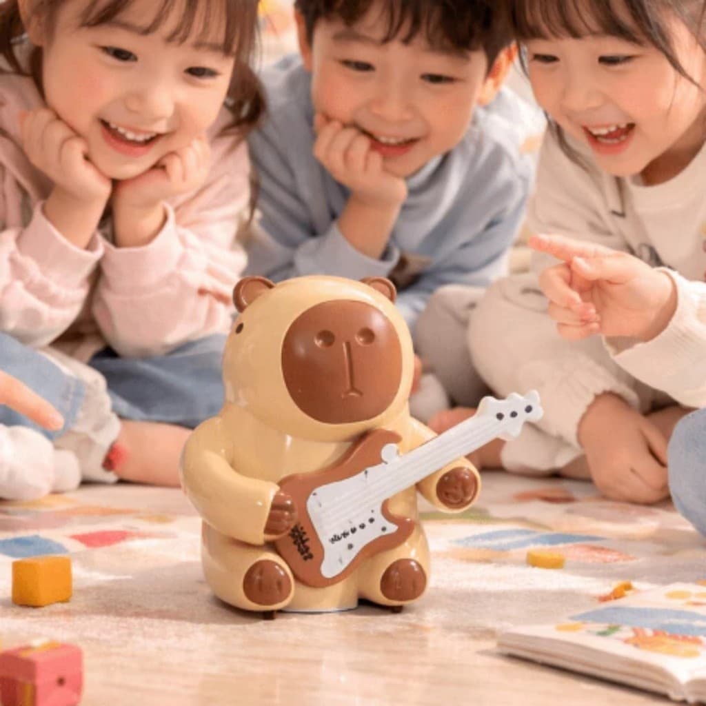Capivara de brinquedo elétrica que balança, canta, dança e toca guitarra. Brinquedo interativo para crianças