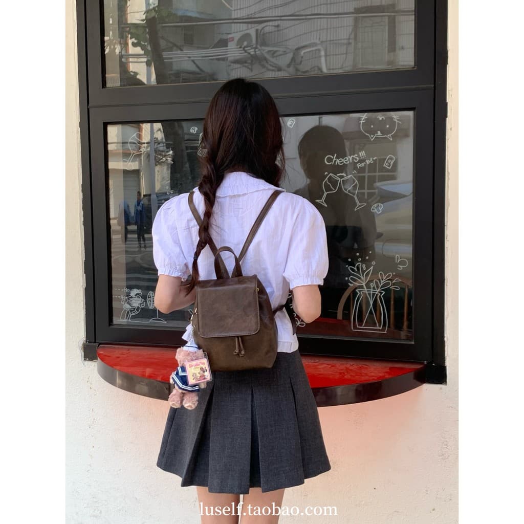 2023 novo estilo americano Retro marrom mochila feminina novo estilo ins pequena textura de cordão pequena mochila bolsa