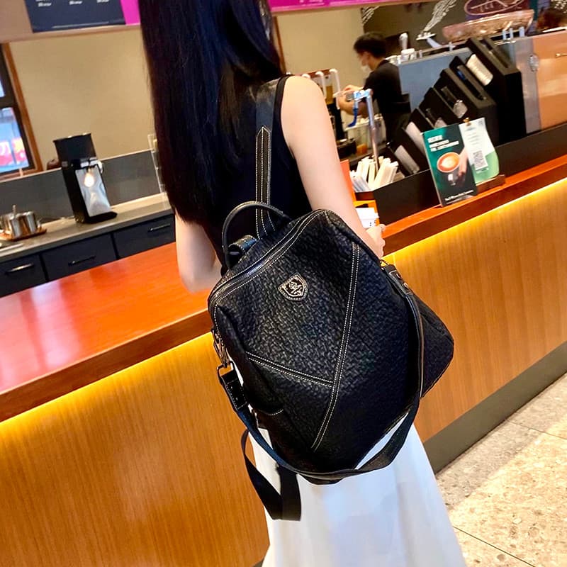 2026 novo estilo Street Wear mochila de couro genuíno feminina Super quente moda mochila versão coreana na moda All-Matc