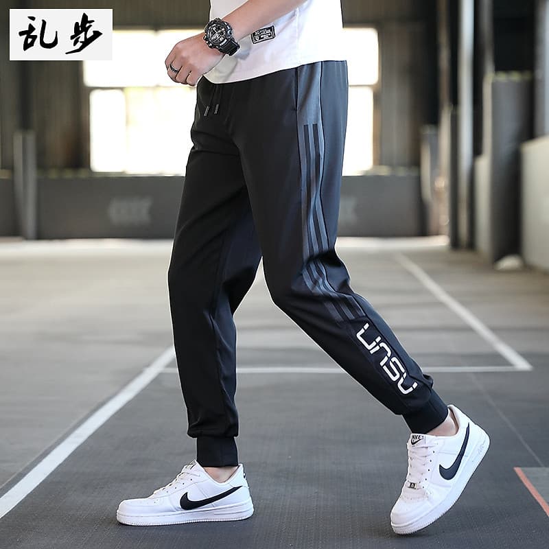 Calças masculinas 2026 primavera esportes soltos Harem calças versão coreana na moda tornozelo comprimento tornozelo bon