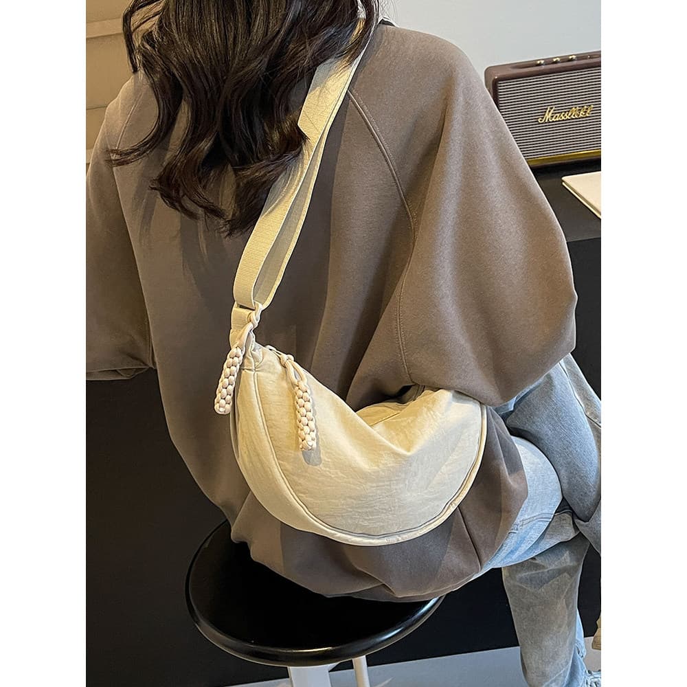 Saco de bolinho feminino saco do mensageiro 2026 novo estilo saco u casa mesmo estilo primavera verão All-Match High-End